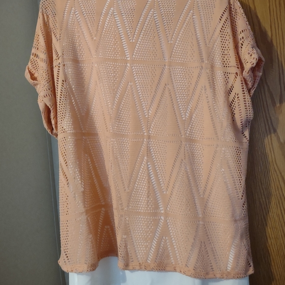 A Peach colored light sweater over a white blouse, size XL. - Picture 2 of 3
